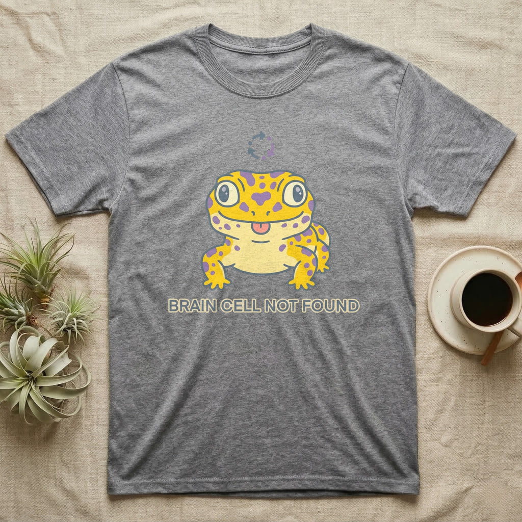 Grey t-shirt with yellow gecko graphic and "BRAIN CELL NOT FOUND" text.