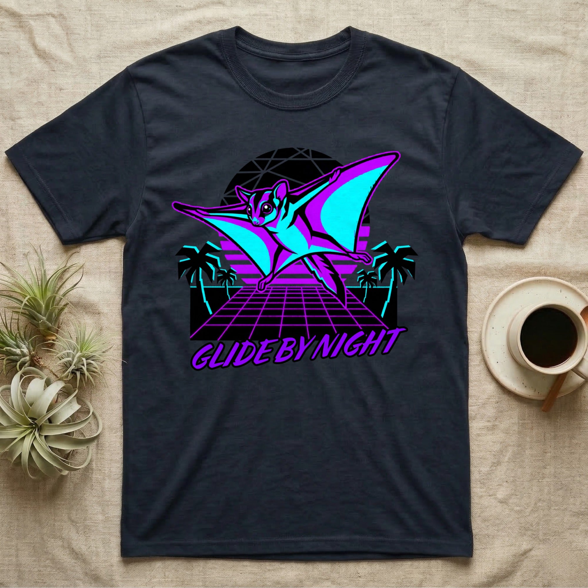 T-shirt with a neon graphic of a flying sugar glider and palm trees.