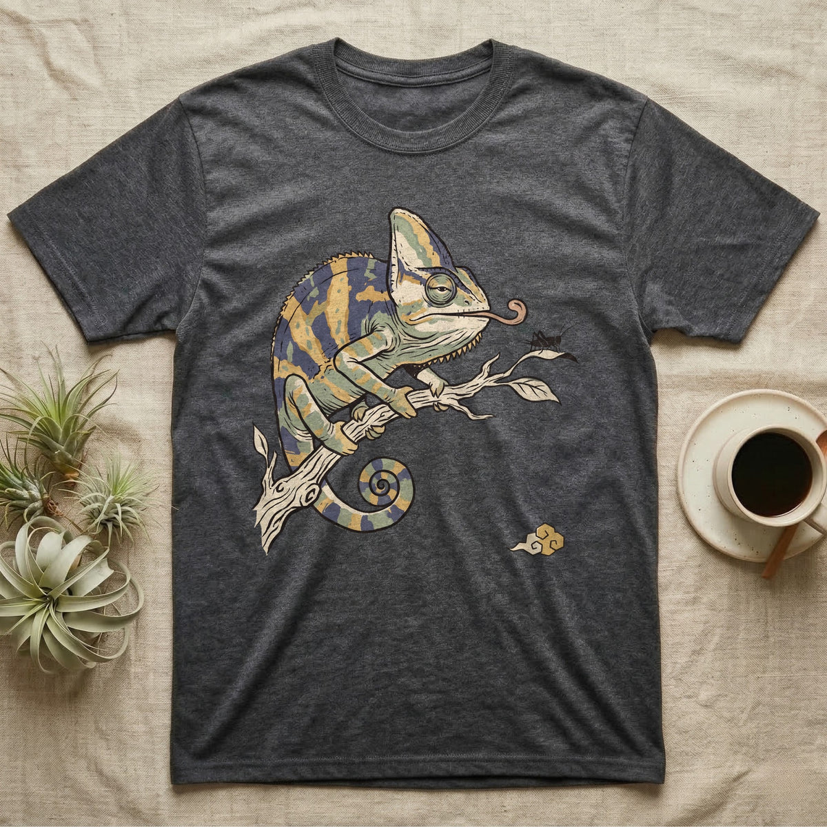 Veiled Chameleon Diet T-Shirt in Dark Heather — Ukiyo-e woodblock illustration of a veiled chameleon extending its tongue, with a deadpan serif caption beneath the subject.