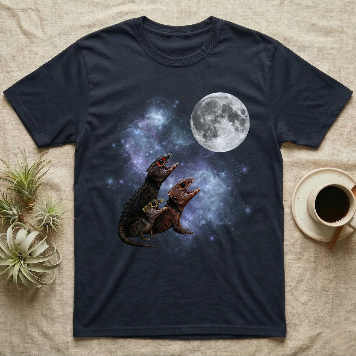 Red-Eyed Crocodile Skink Moon Howl T-Shirt in Navy — Three Red-Eyed Crocodile Skink colour morphs howling at a full moon over a nebula on a dark grey t-shirt.