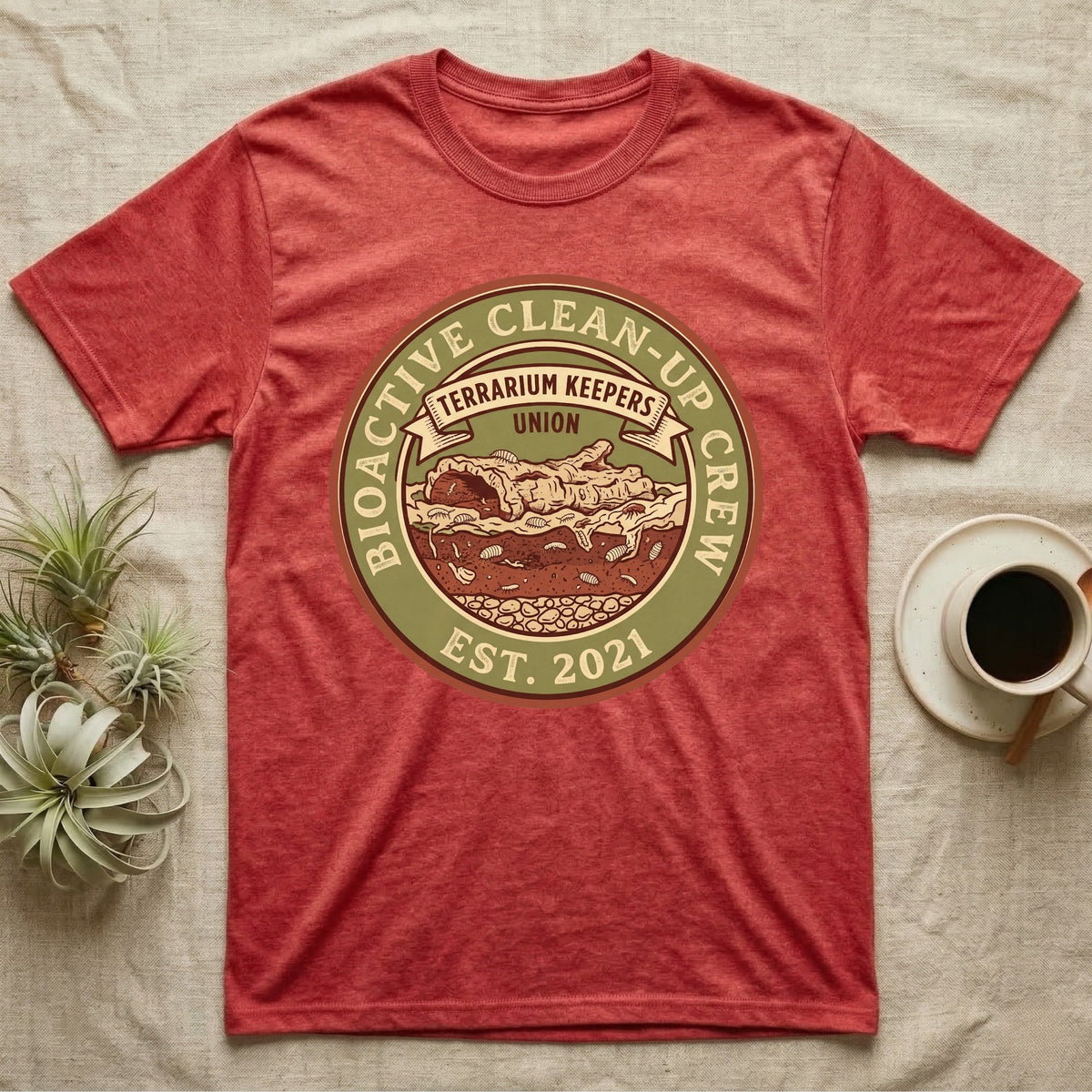 Isopod Terrarium Keepers Union T-Shirt in Heather Red — Vintage union badge showing a cross-sectioned bioactive vivarium worked by isopods and springtails.