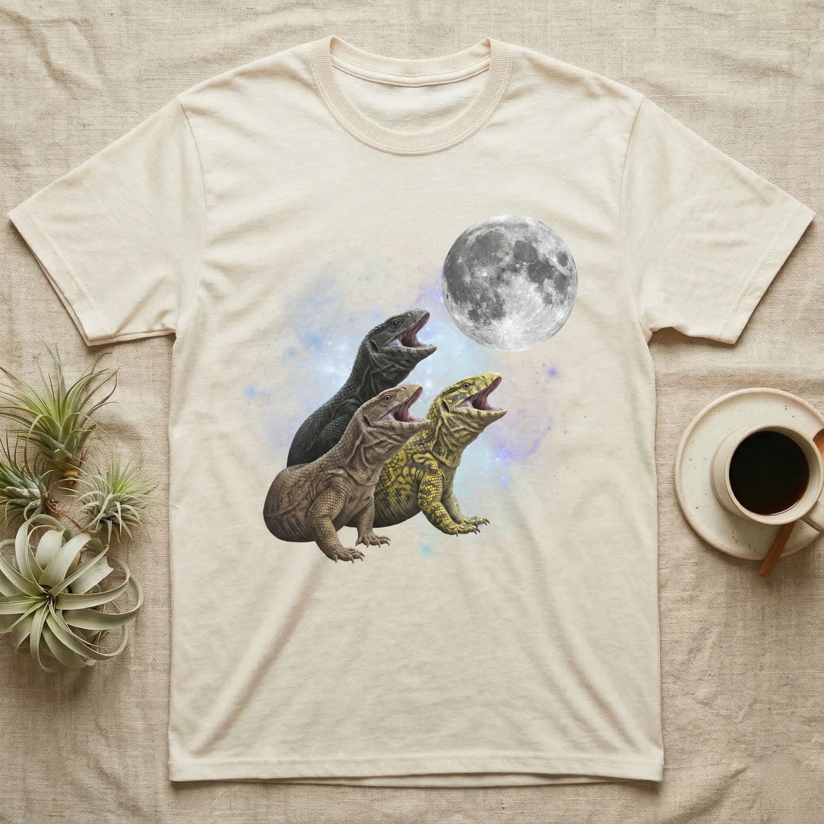Savannah Monitor Moon Howl T-Shirt in Natural — Three Savannah Monitor colour morphs howling at a full moon over a nebula on a dark grey t-shirt.