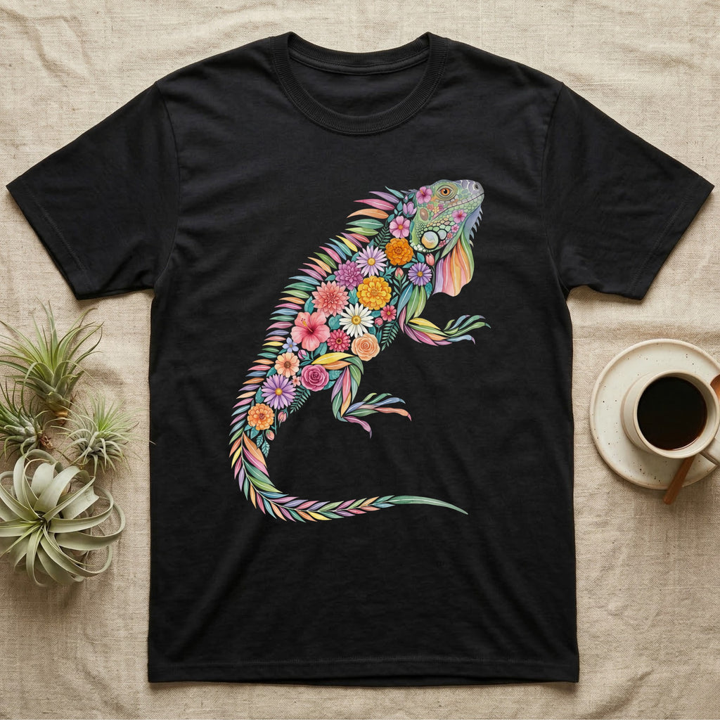 Green Iguana Floral Mosaic T-Shirt in Black — Watercolour green iguana climbing, its whole body built from painted hibiscus, dandelion and leaf shapes.