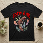 Satanic Leaf-Tailed Gecko Feral T-Shirt in Black — Satanic leaf-tailed gecko gaping on a twig with dripping blood-red metal "Leaf Me Alone" wordmark above