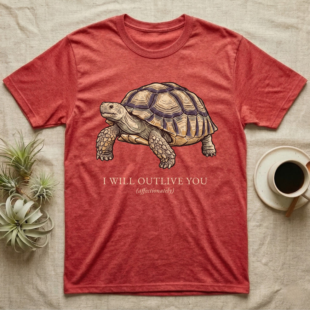 Sulcata Outlive You T-Shirt in Heather Red — Ukiyo-e woodblock illustration of a sulcata tortoise in profile with a deadpan serif caption about outliving you.