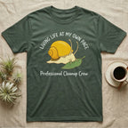 T-shirt with snail cartoon and text "Living Life At My Own Pace Professional Cleanup Crew".