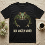 Photographic mugshot of a Pacman frog with a mouth spanning its head above the hook I Am Mostly Mouth. — shown on a Black tee.