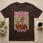 Corn Snake Club T-Shirt in Dark Chocolate — Engraved corn snake sitting deadpan under pink lettering The One More Club, with This is definitely the last one below, on yellow stripes