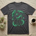 Green Iguana Cosmic T-Shirt in Dark Heather — Vintage screen-print illustration of green iguanas in astronaut helmets floating in space, cosmic emerald green monochromatic on dark background.