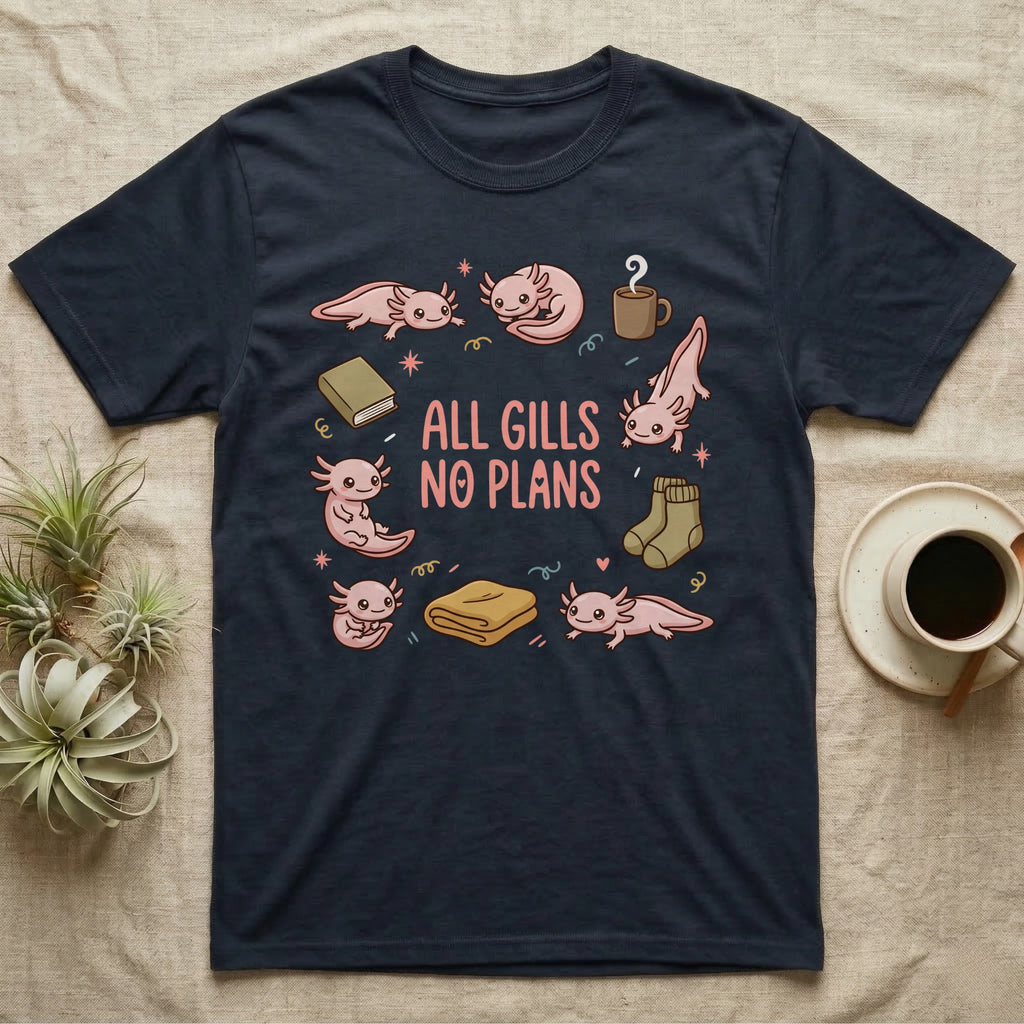 Axolotl All Gills No Plans T-Shirt in Navy — Cartoon sticker collection of six leucistic axolotls resting among a mug, socks, a blanket and a book, under the words ALL GILLS NO PLANS.