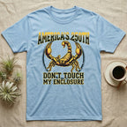 Emperor Scorpion Enclosure Tee in Light Blue — Bold gold and maroon halftone tee of an emperor scorpion with raised pincers, lettering reading AMERICA'S 250TH Don't Touch My Enclosure on black.