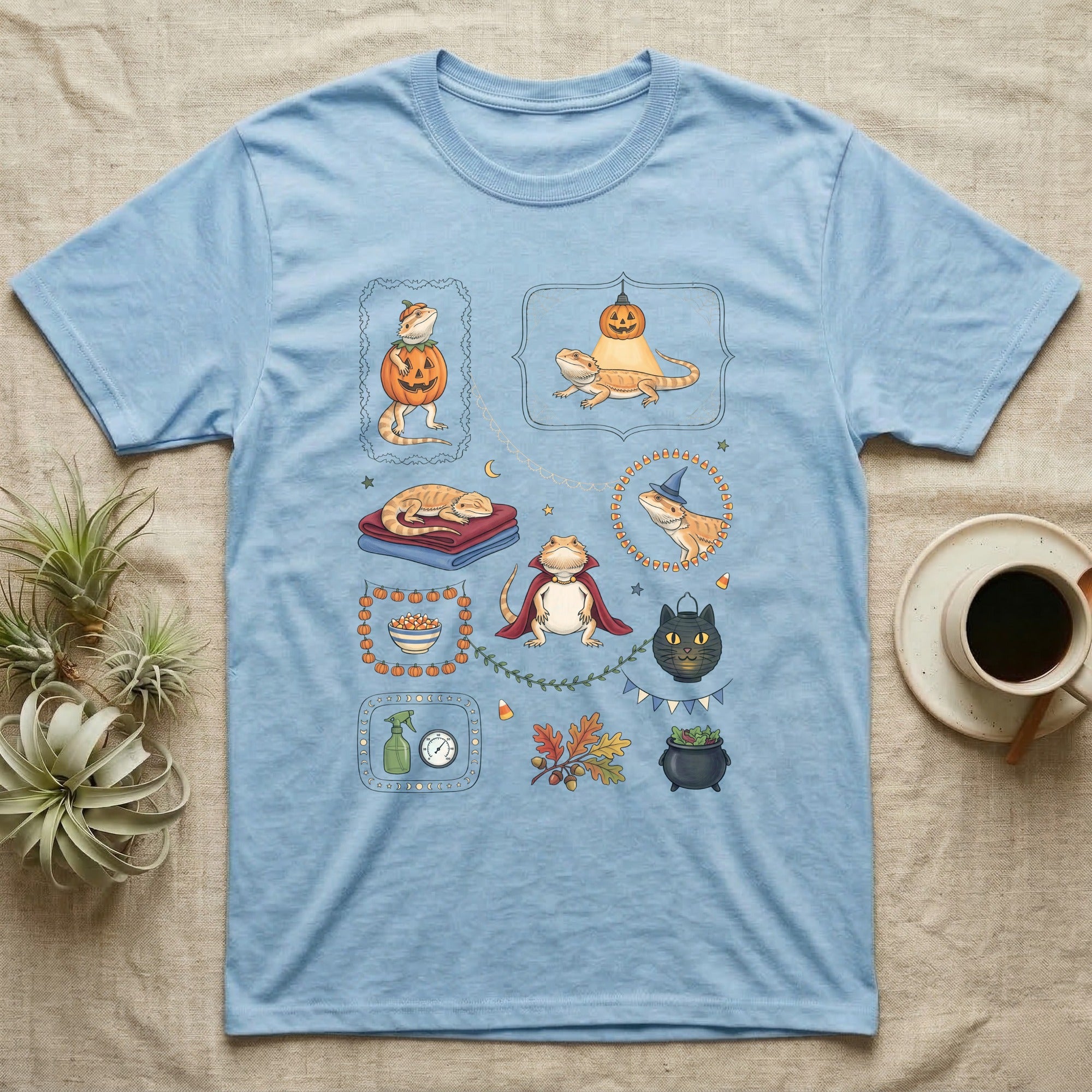 Bearded Dragon Halloween Sampler T-Shirt in Light Blue — Gouache sampler of ten bearded dragon Halloween vignettes — pumpkin costume, witch hat, red cape — on dark charcoal.