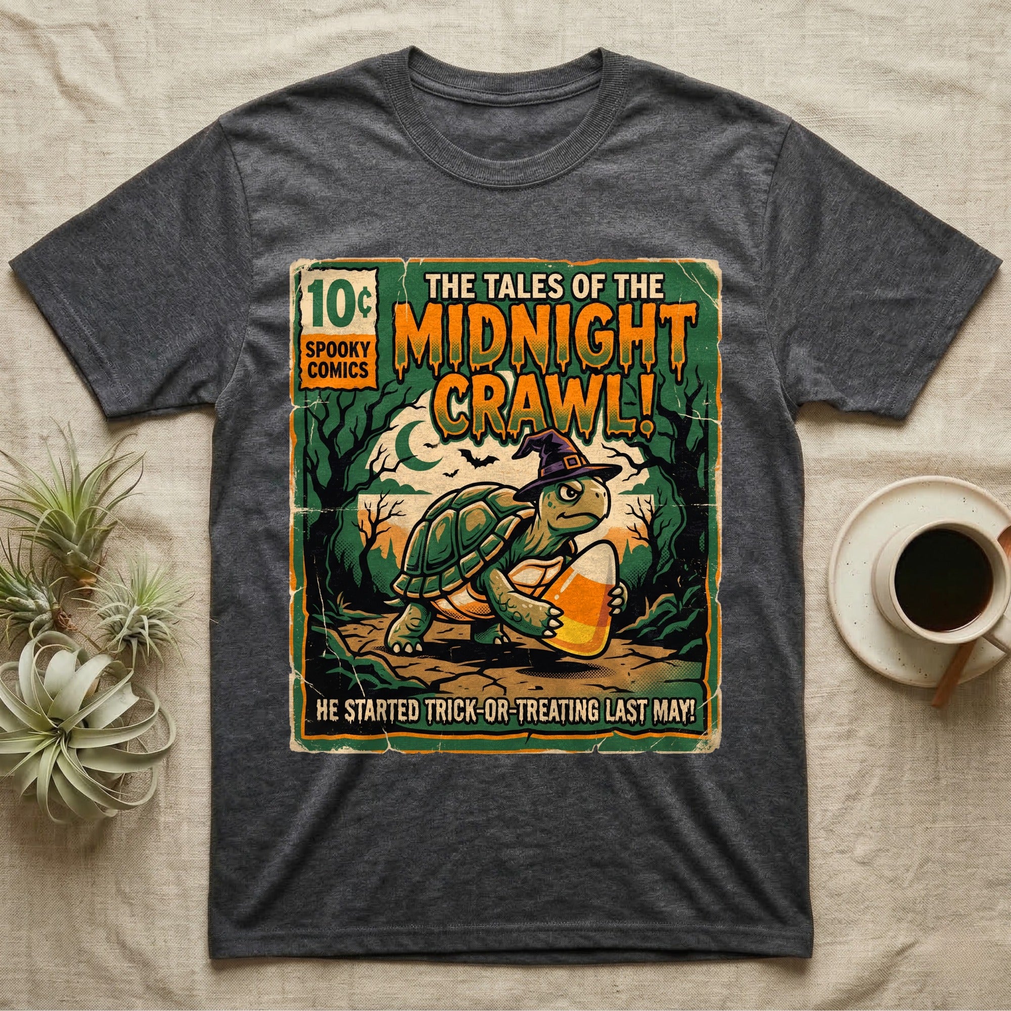 Tortoise Midnight Crawl Comic T-Shirt in Dark Heather — Vintage comic cover of a witch-hatted tortoise with candy corn in a moonlit forest, "Tales of the Midnight Crawl."