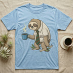 Light blue t-shirt with cartoon sloth in shirt holding coffee cup, text reads "World's Okayest Employee".