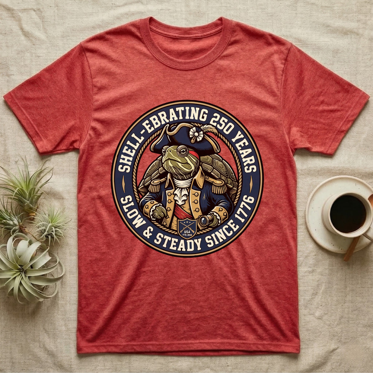 Sea Turtle General T-Shirt in Heather Red — Circular crest of a sea turtle dressed as a Continental general with text Shell-Ebrating 250 Years.