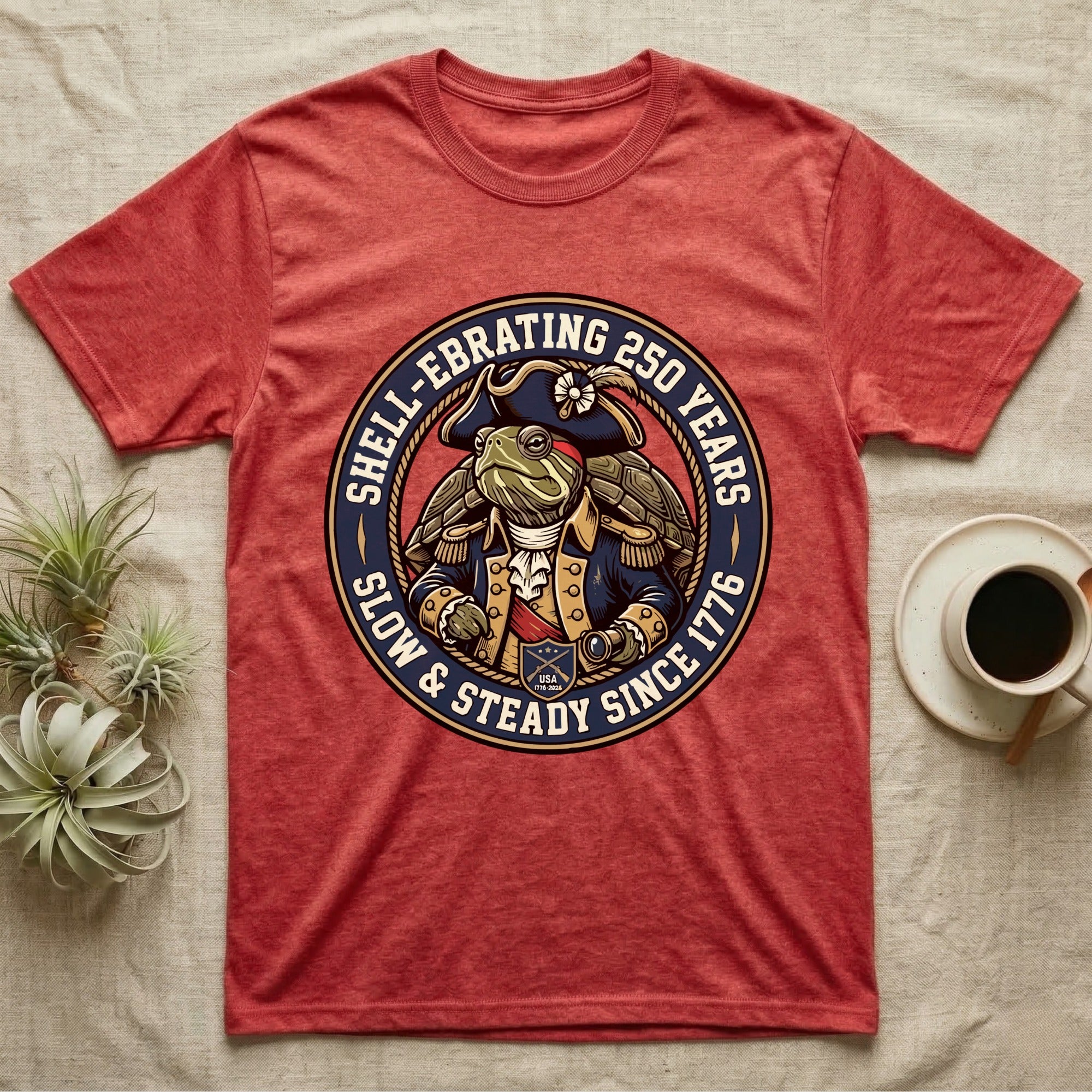 Sea Turtle General T-Shirt in Heather Red — Circular crest of a sea turtle dressed as a Continental general with text Shell-Ebrating 250 Years.