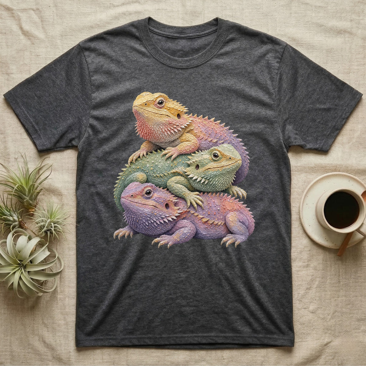 T-shirt with three stacked bearded dragons graphic.