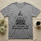 Russian Tortoise Mornings T-Shirt in Sport Grey — Charcoal drawing of a grumpy Russian tortoise yelling up at a basking lamp above the words NOT BEFORE MY BASKING LAMP.