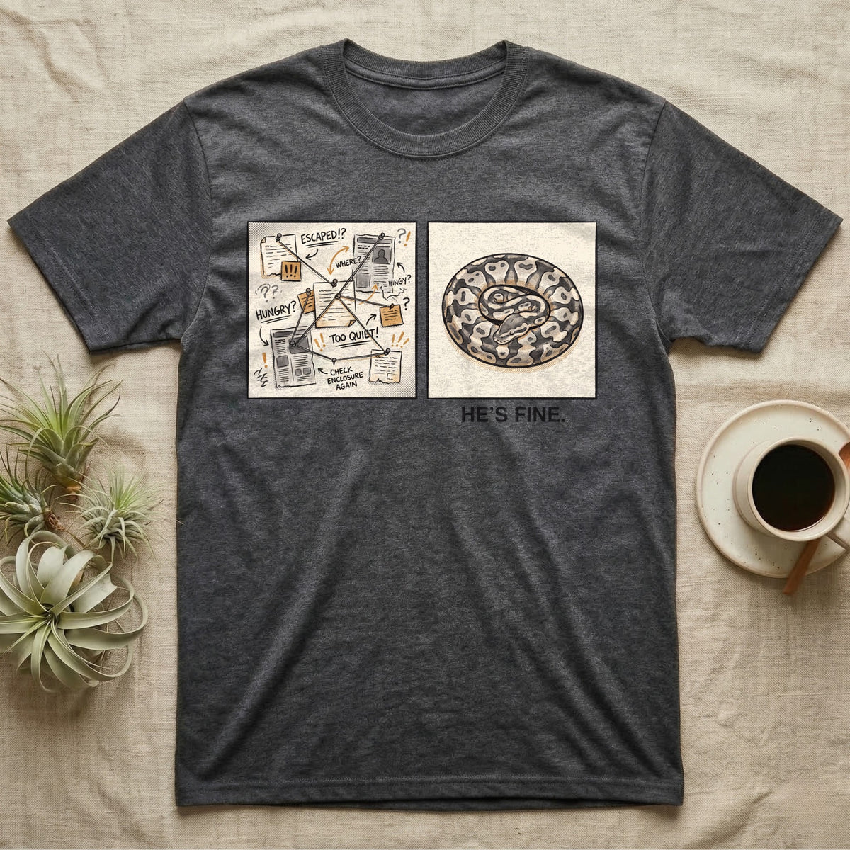 He's Fine Ball Python T-Shirt in Dark Heather — Two-panel illustration of a frantic conspiracy board beside a serene coiled ball python captioned "He's Fine."