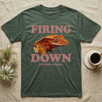 Crested Gecko Firing Down T-Shirt in Military Green — Engraved crested gecko in navy ink between the rose words Firing and Down, with give him a minute above.