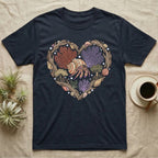 Dark t-shirt with heart-shaped natural design featuring hermit crab and seashells.