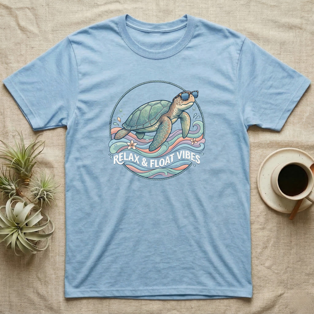 Blue t-shirt with a sea turtle wearing sunglasses on a circular design.