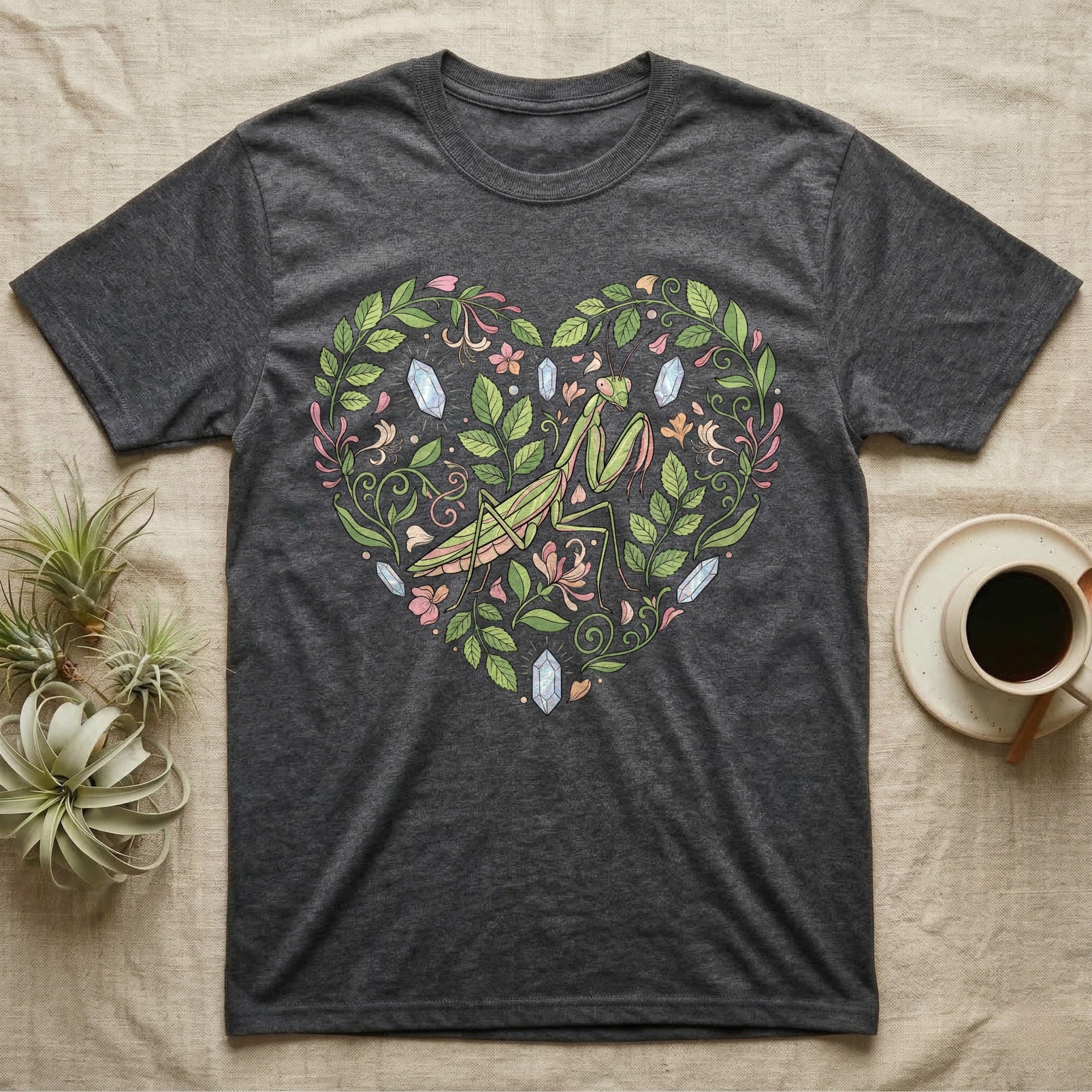 Dark grey t-shirt with praying mantis and floral heart design.
