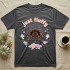Mexican Redknee Tarantula Baby T-Shirt in Dark Heather — Fuzzy Mexican redknee tarantula on a pastel web with blossoms under puffy peach bubble text "just fluffy".