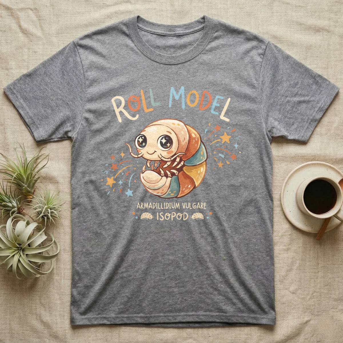 Roly Poly Isopod Roll Model T-Shirt in Sport Grey — Storybook roly poly curled into a roll with starry eyes and confetti under hand-lettered "Roll Model".