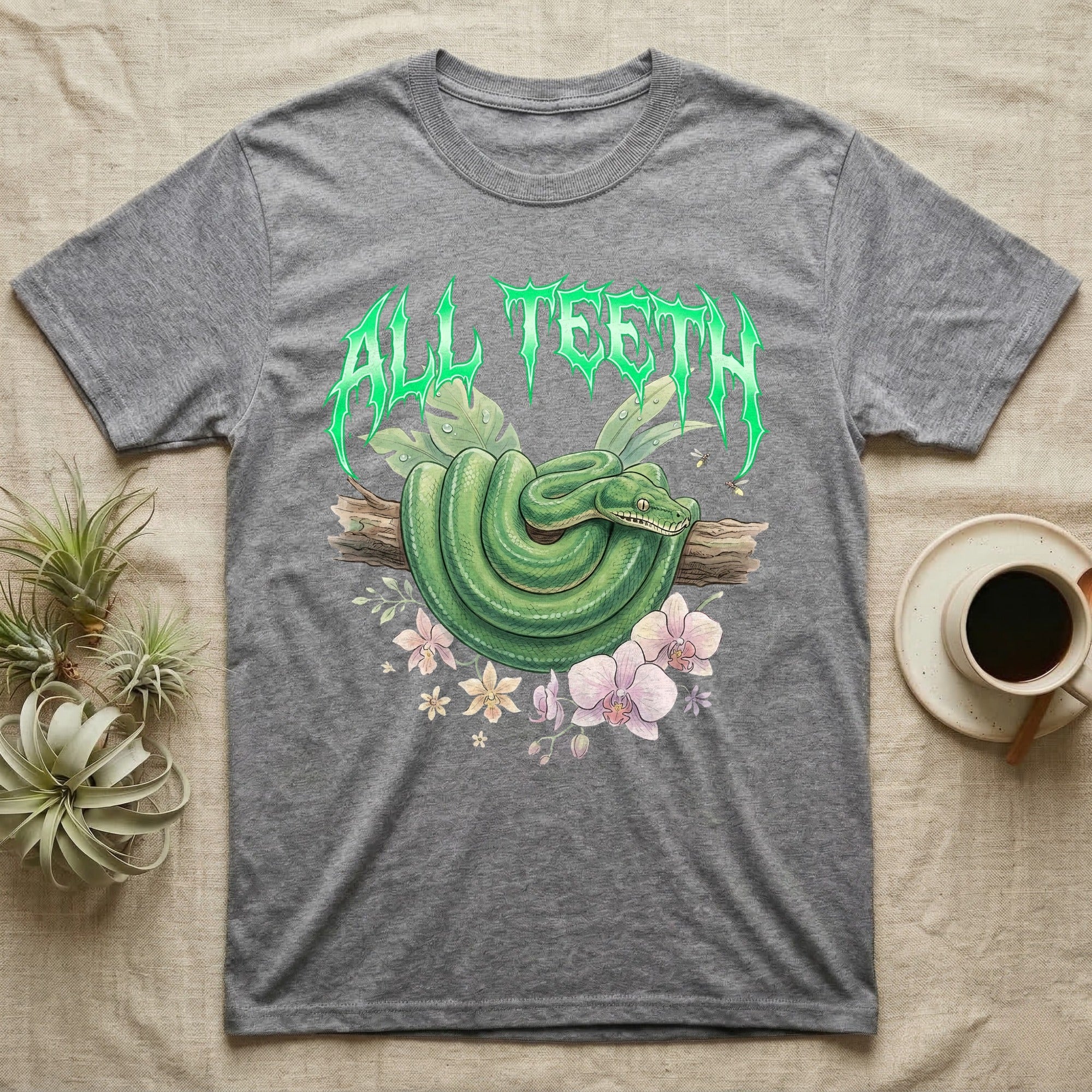 Emerald Tree Boa Feral T-Shirt in Sport Grey — Coiled emerald tree boa on a branch below a dripping emerald-green metal "All Teeth" wordmark