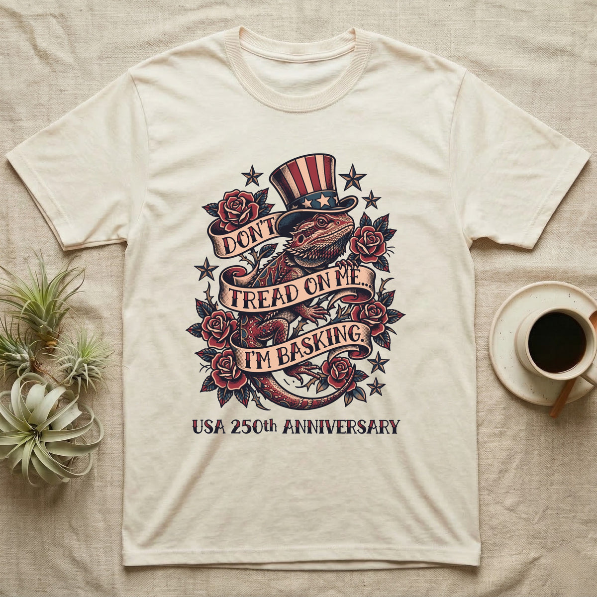 Bearded Dragon Tattoo T-Shirt in Natural — Tattoo-flash bearded dragon in a star top hat among roses with banners reading Don't Tread On Me I'm Basking.