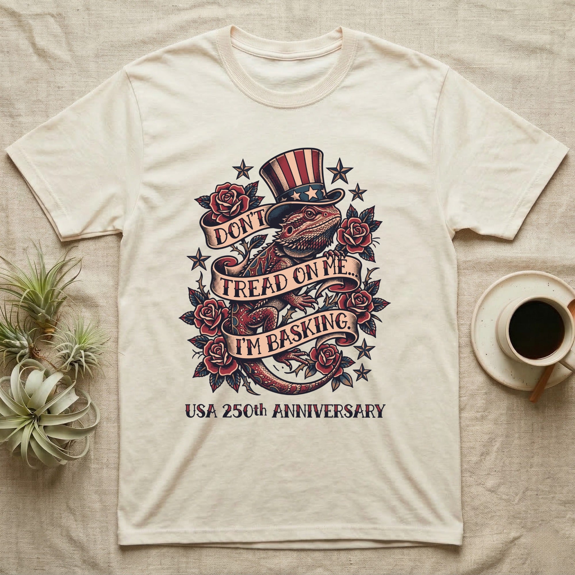 Bearded Dragon Tattoo T-Shirt in Natural — Tattoo-flash bearded dragon in a star top hat among roses with banners reading Don't Tread On Me I'm Basking.