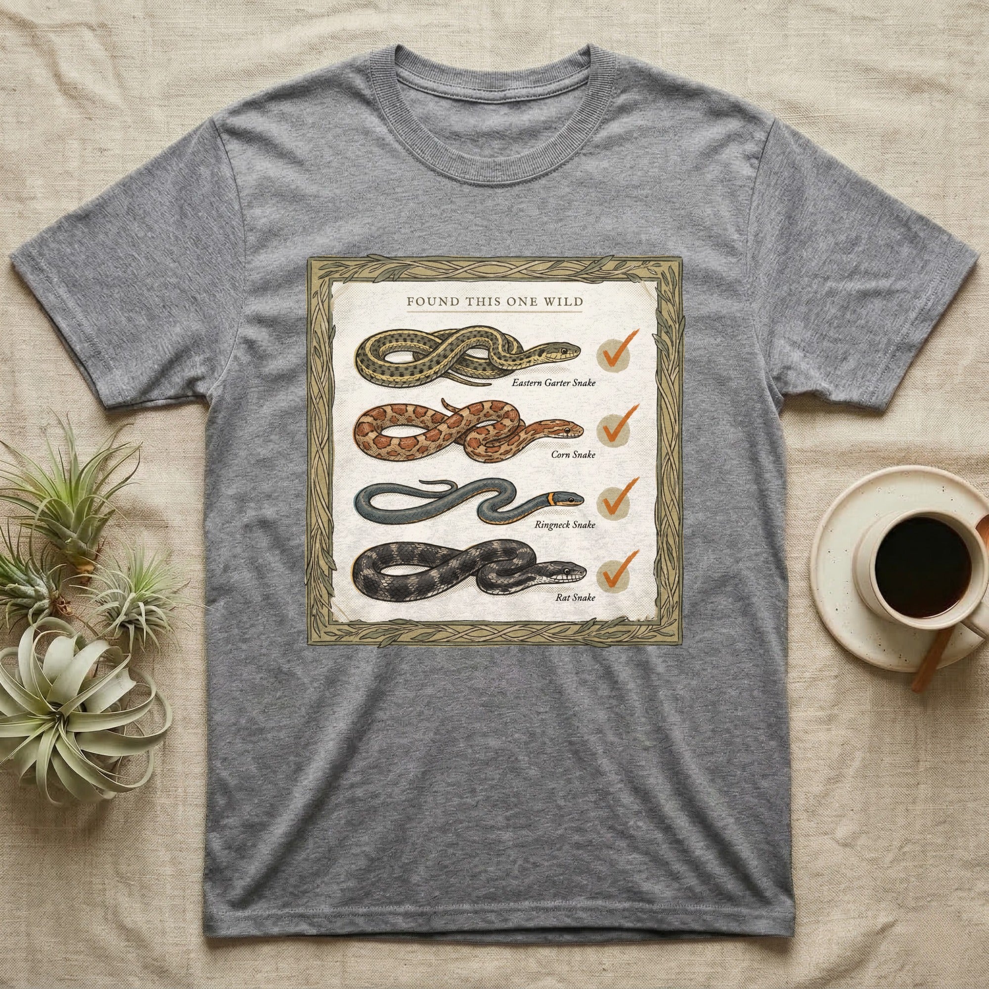 Native Snake Life List T-Shirt in Sport Grey — Vintage field-guide life list of native snakes drawn as small specimens with tally checkmarks beside each.