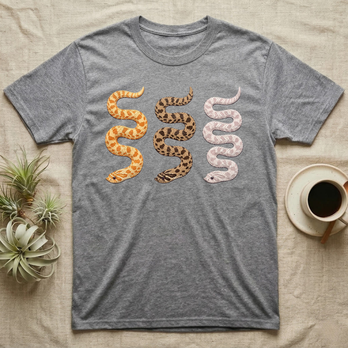 Hognose Morph Triptych T-Shirt in Sport Grey — Palette-knife painting of three western hognose snakes side by side, albino, anaconda and snow morphs.