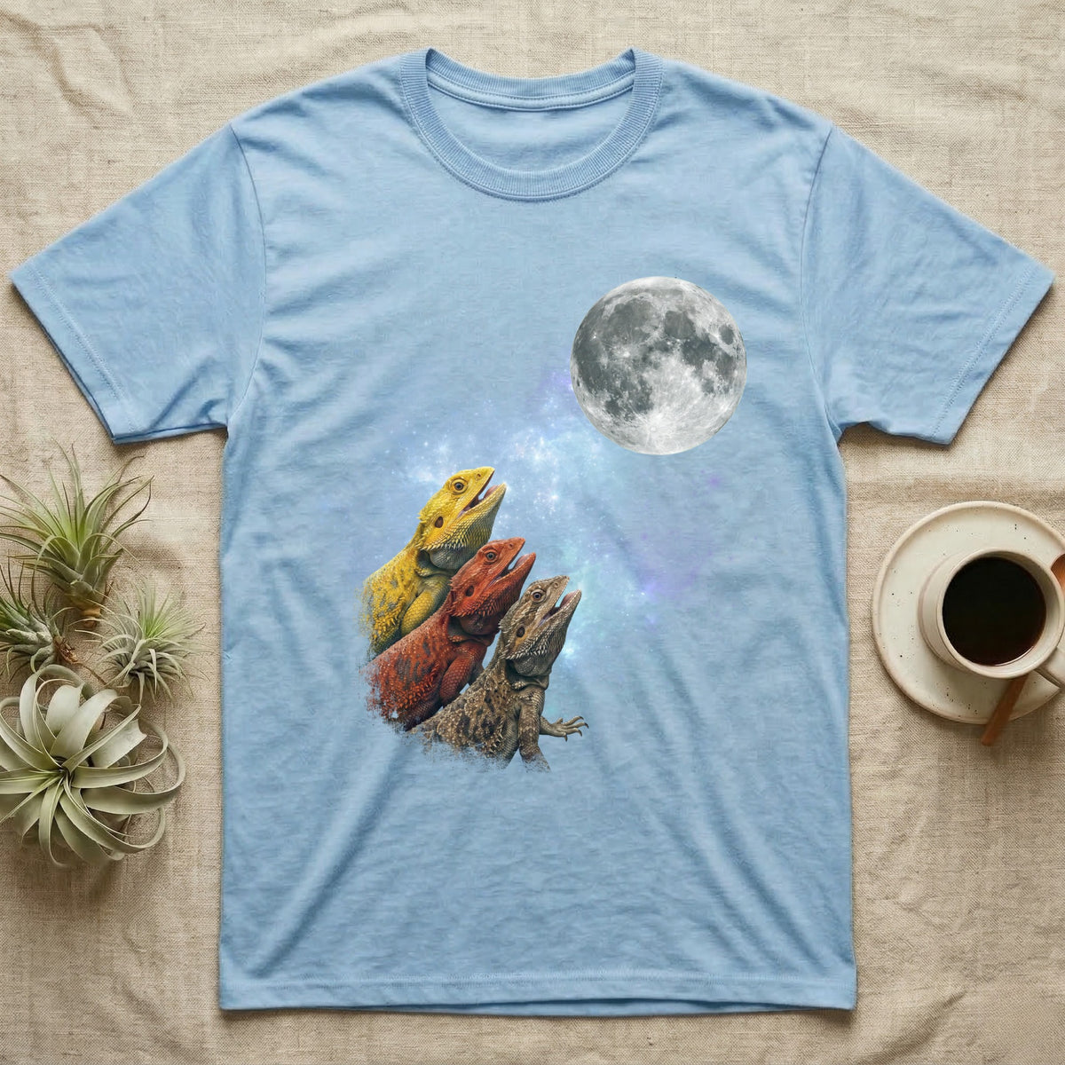 Bearded Dragon Moon Howl T-Shirt in Light Blue — Three Bearded Dragon colour morphs howling at a full moon over a nebula on a dark grey t-shirt.