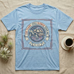 Slower Than Me Tortoise T-Shirt in Light Blue — Vintage-Americana roundel illustration of a tortoise with a banner reading "250 Years, Still Slower Than Me."