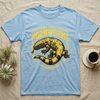 Gila Monster Hornworms Tee in Light Blue — Bold gold and maroon woodcut tee of a Gila monster with banded tail, large text reading Don't Feed Me Hornworms, on black.