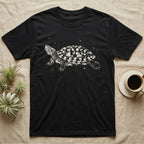 Red-Eared Slider Bleach T-Shirt in Black — Red-eared slider in side view basking with its neck stretched out, made of pale bleach spatter on black