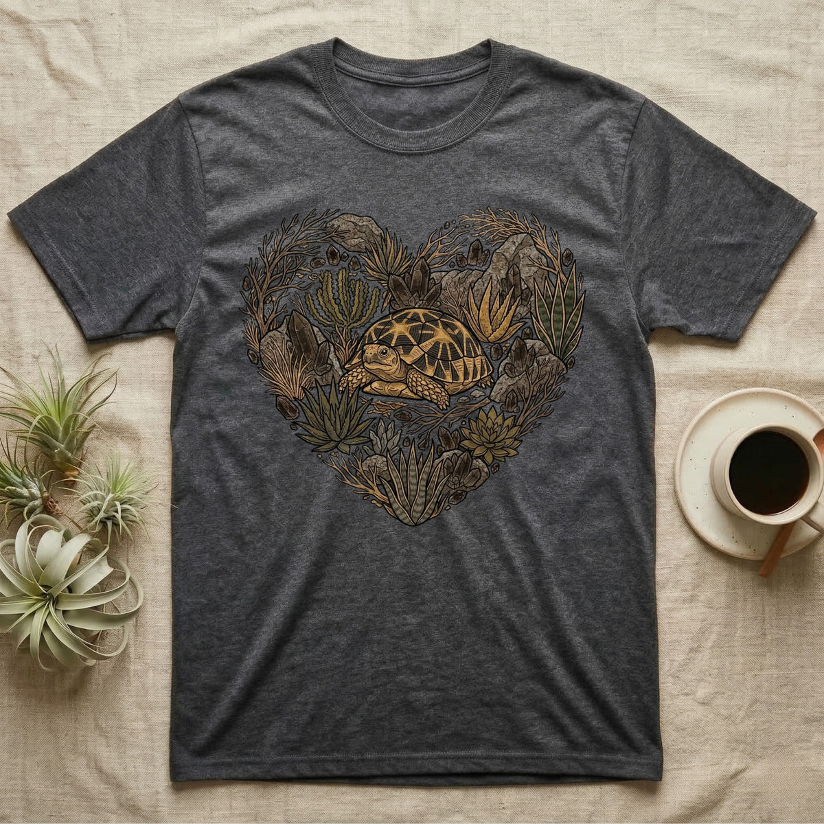 Dark grey t-shirt with a heart-shaped succulent and tortoise graphic.