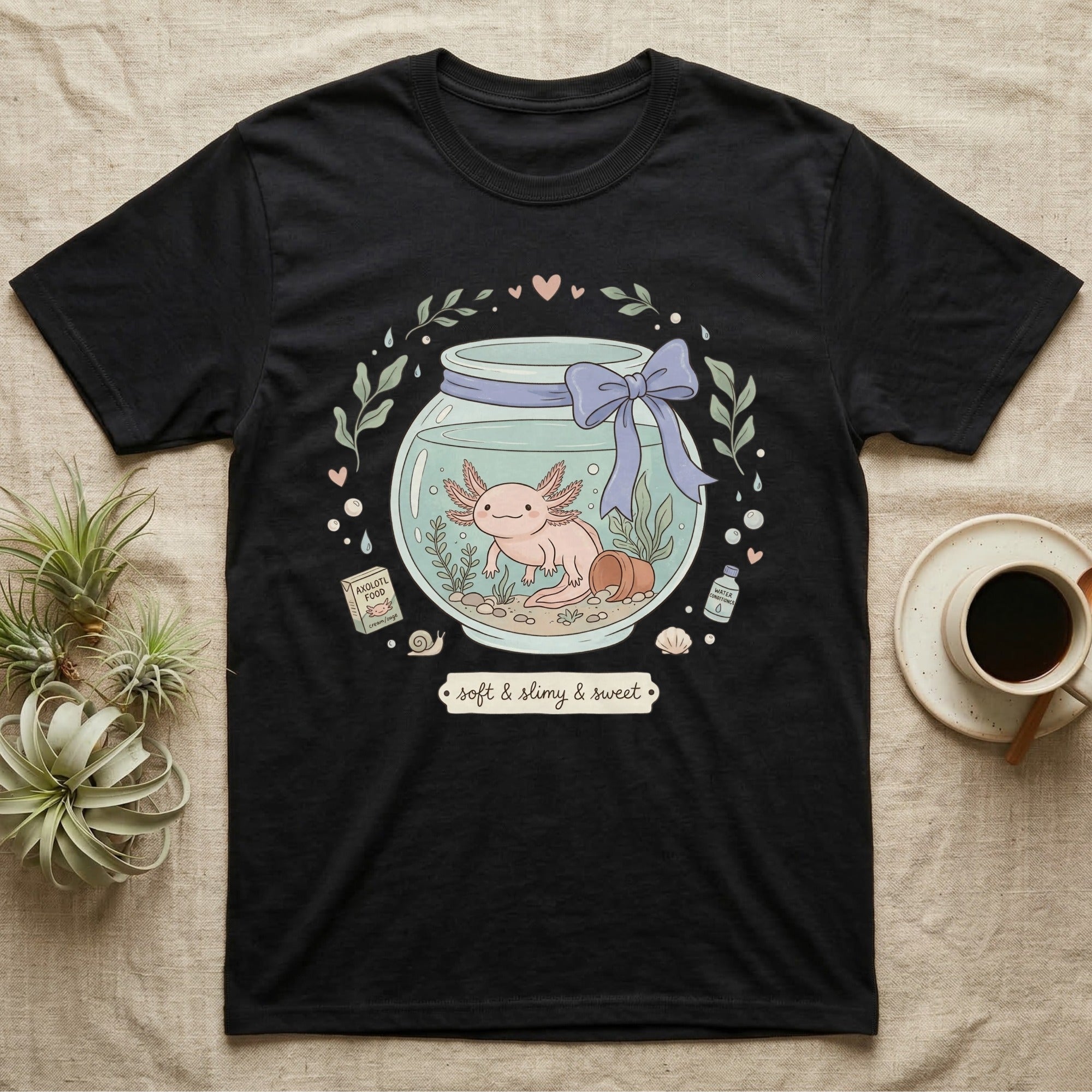Black t-shirt with cute axolotl in a jar, leaves, and text.