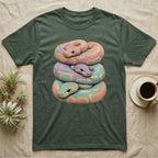 Stacked pastel snakes on a dark green t-shirt.