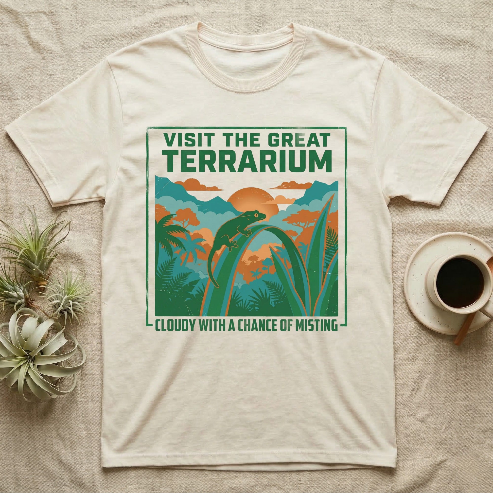Cream t-shirt with "Visit the Great Terrarium" and "Cloudy with a Chance of Misting" text.