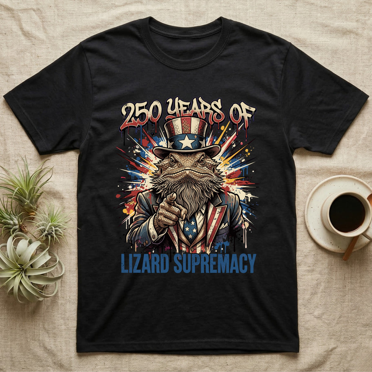 Bearded Dragon Uncle Sam T-Shirt in Black — Splatter-art bearded dragon as Uncle Sam pointing forward under text 250 Years of Lizard Supremacy.