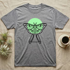 Grey t-shirt with a black line drawing of a luna moth and green circle.