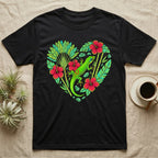 Black t-shirt with a heart-shaped design of a gecko, tropical leaves, and red hibiscus flowers.