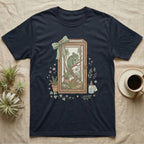 Chameleon in terrarium design on a navy t-shirt, with plants and a gift ribbon.