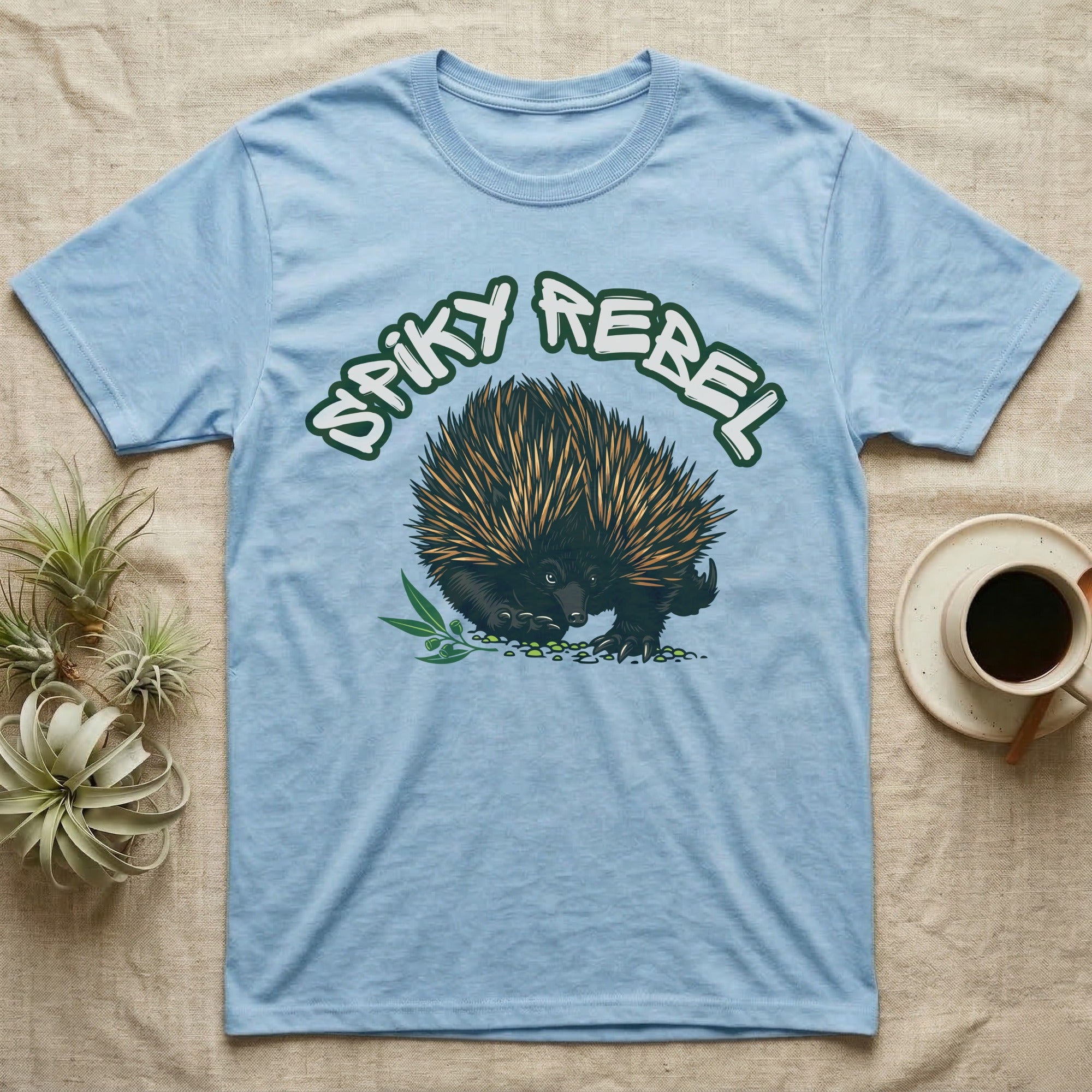 Light blue t-shirt with "Spiky Rebel" text and an echidna graphic.