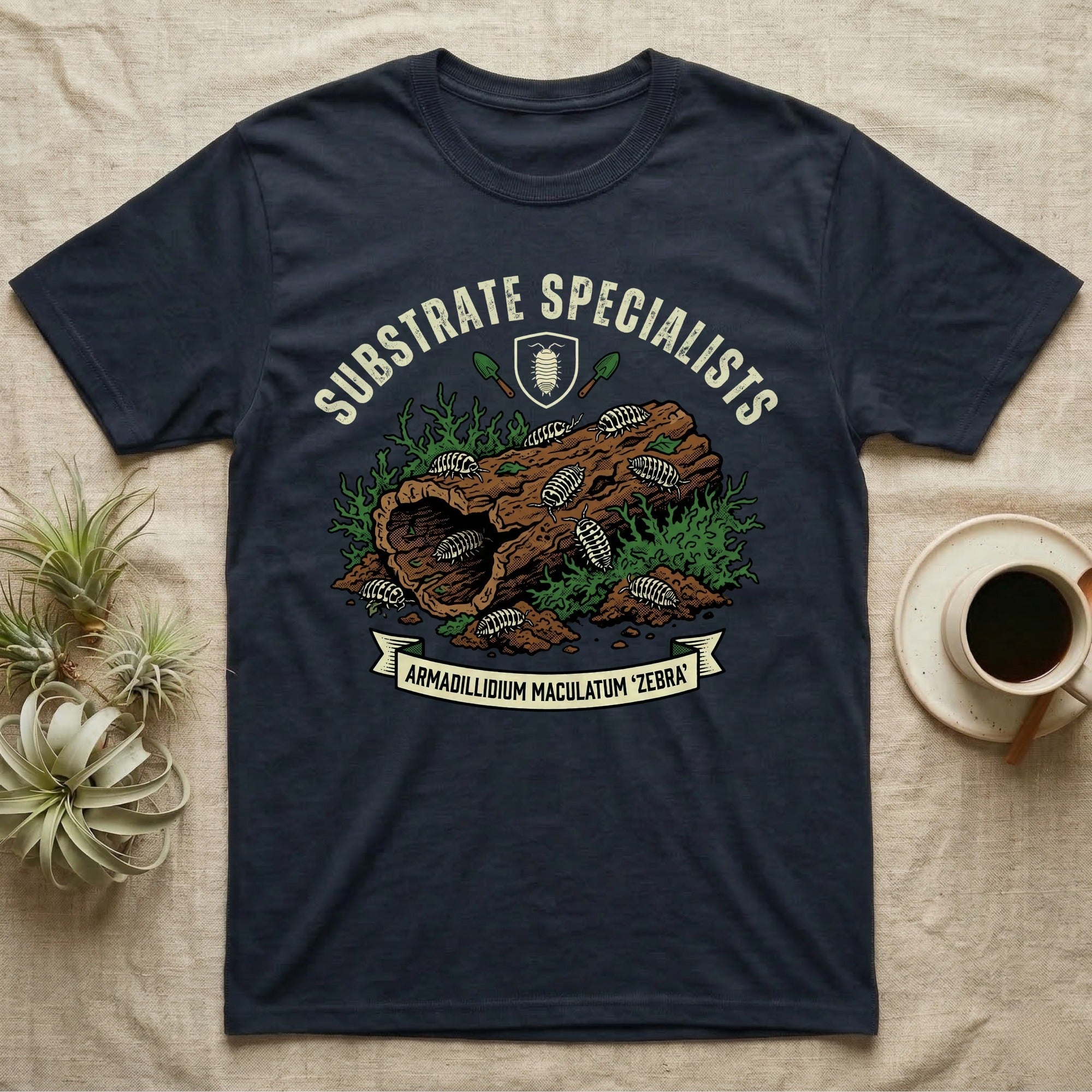 Zebra Isopod Substrate Specialists T-Shirt in Navy — Vintage crest of zebra isopods on a mossy cork log with crossed trowels and Armadillidium ribbon.
