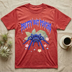 Cobalt Blue Tarantula Feral T-Shirt in Heather Red — Cobalt blue tarantula with electric-blue legs under jagged cobalt metal text PRETTY BUT PSYCHO with pastel blossoms