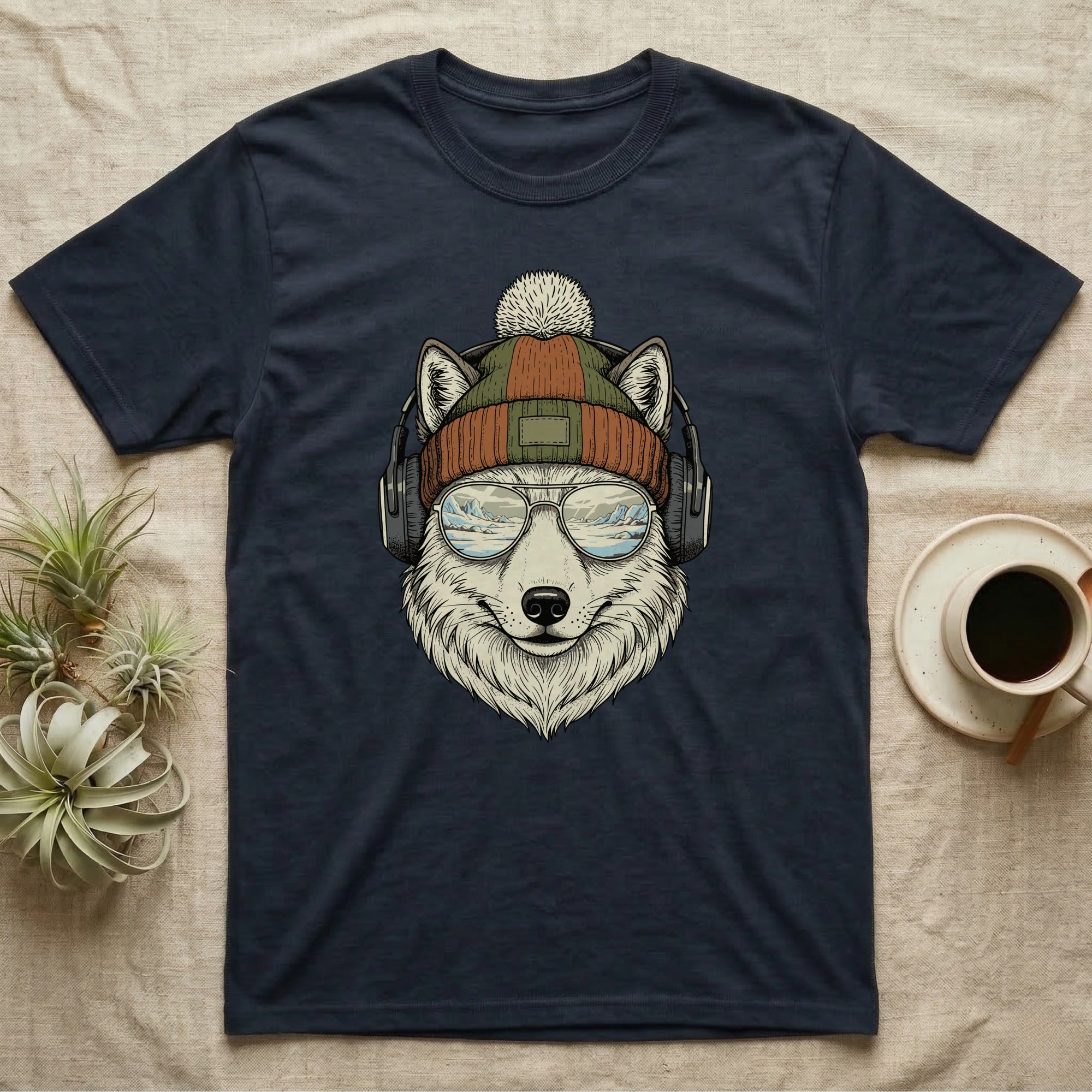Dark t-shirt featuring a cartoon wolf wearing a beanie, headphones, and sunglasses.